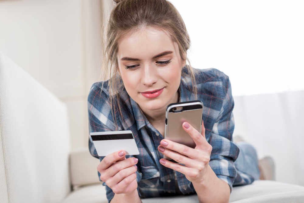 Women making a mobile payment